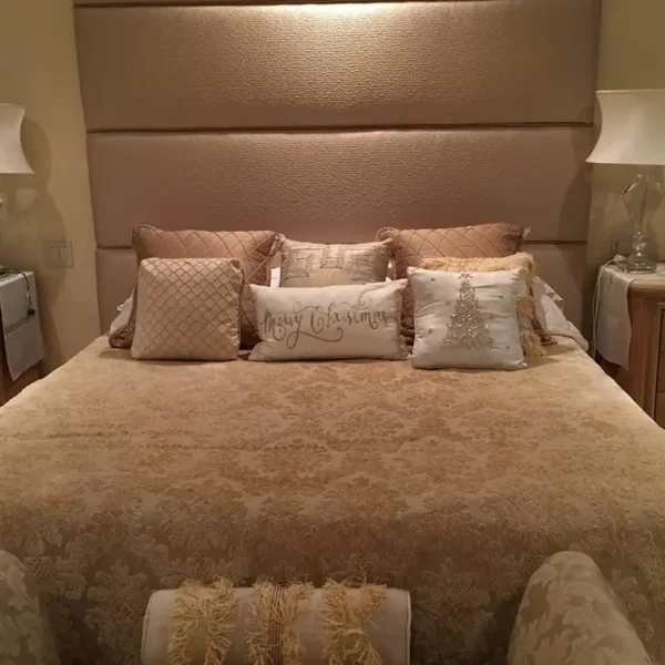 Custom upholstered champagne headboard and bedding by Ash Street Upholstery, Springfield, IL