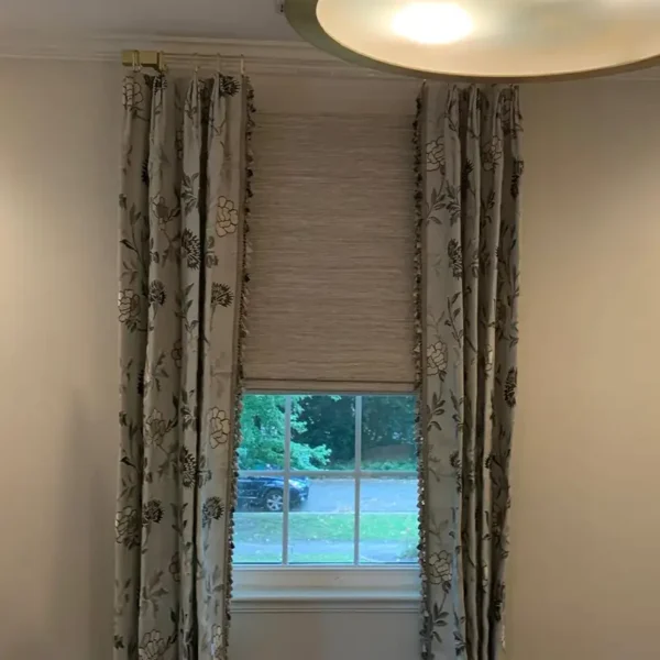 Custom floral drapery panels with woven Roman shade by Ash Street Upholstery, Springfield, IL