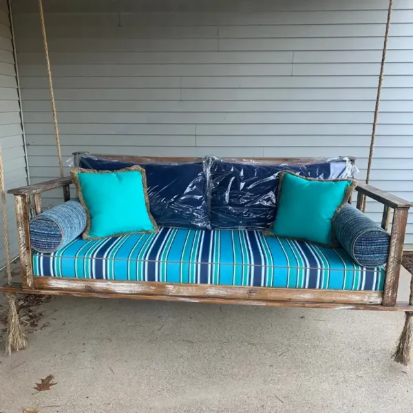 Custom outdoor porch swing cushions and pillows reupholstered by Ash Street Upholstery, Springfield, IL