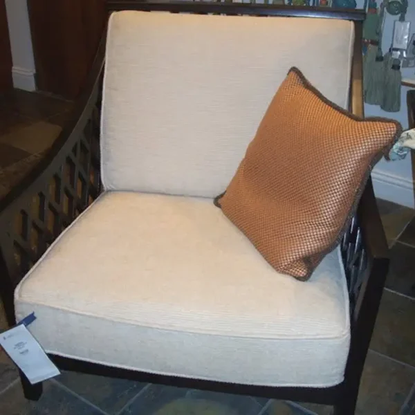 Custom wood-frame accent chair reupholstered in cream fabric by Ash Street Upholstery, Springfield, IL