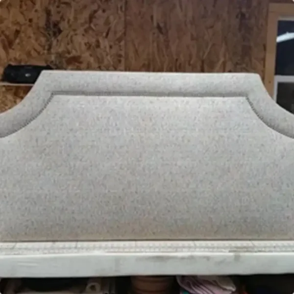 Custom upholstered scalloped headboard in progress at Ash Street Upholstery workshop, Springfield, IL