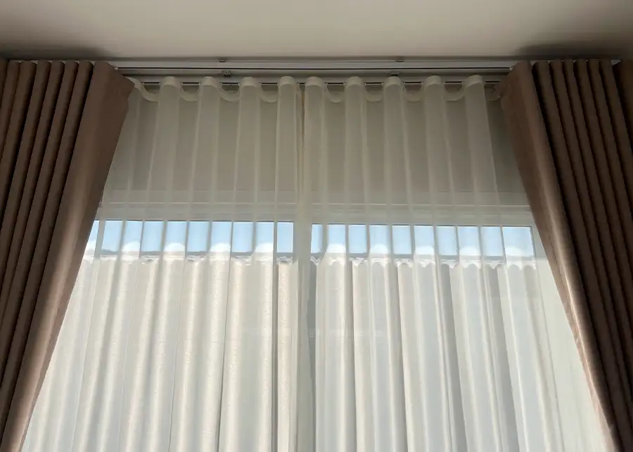 Custom Ripplefold sheer and drapery pair by Ash Street Upholstery in Springfield, IL window treatment design