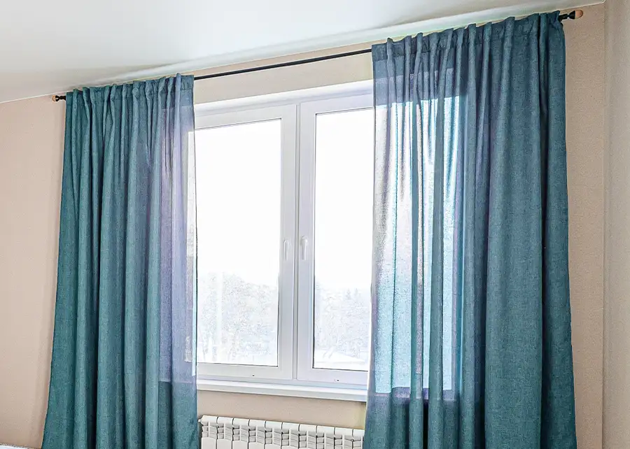 Custom teal linen Rod Pocket drapery panels by Ash Street Upholstery in Springfield, IL window treatment design