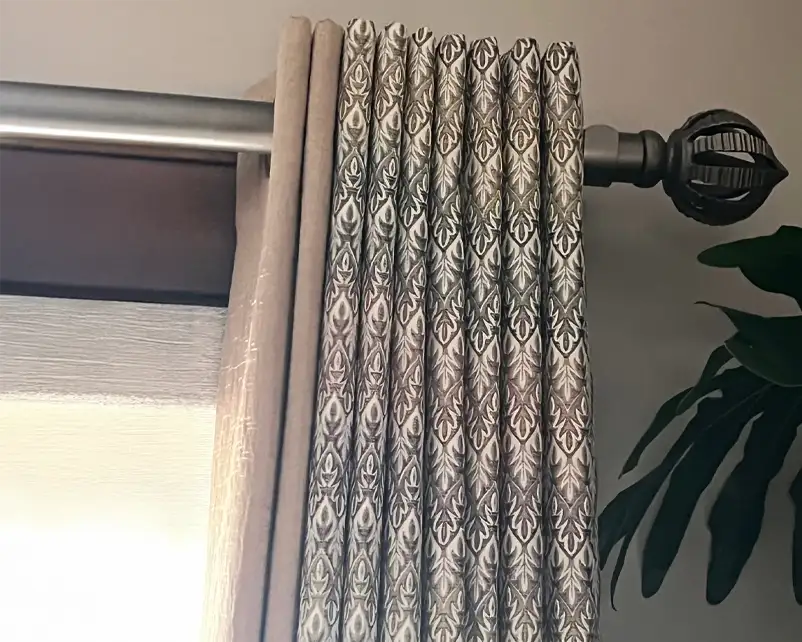 Custom pleated drapery detail with decorative rod by Ash Street Upholstery in Springfield, IL window treatment design