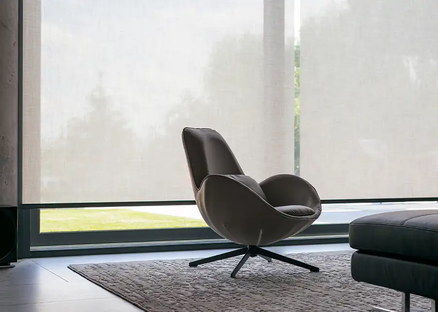 Custom solar shade providing privacy and light control by Ash Street Upholstery in Springfield, IL