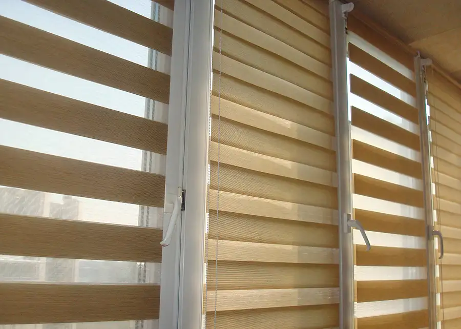 Custom tan dual-layer zebra shades by Ash Street Upholstery in Springfield, IL window treatment design