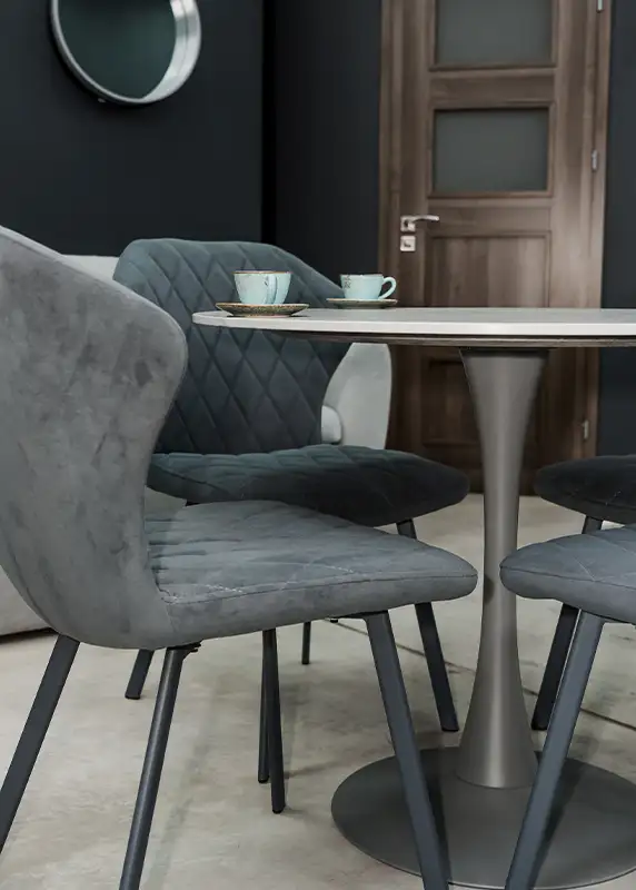 Ash Street Upholstery custom dining chairs with diamond-stitched gray velvet upholstery, interior design by AFAR Imports & Interiors Springfield IL